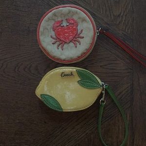 Lemon and crab coach wristlets